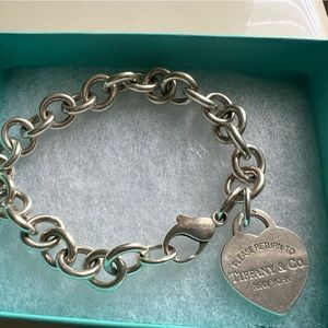 Tiffany & Co.  bracelet and charm. 100% authentic just needs a good polish.